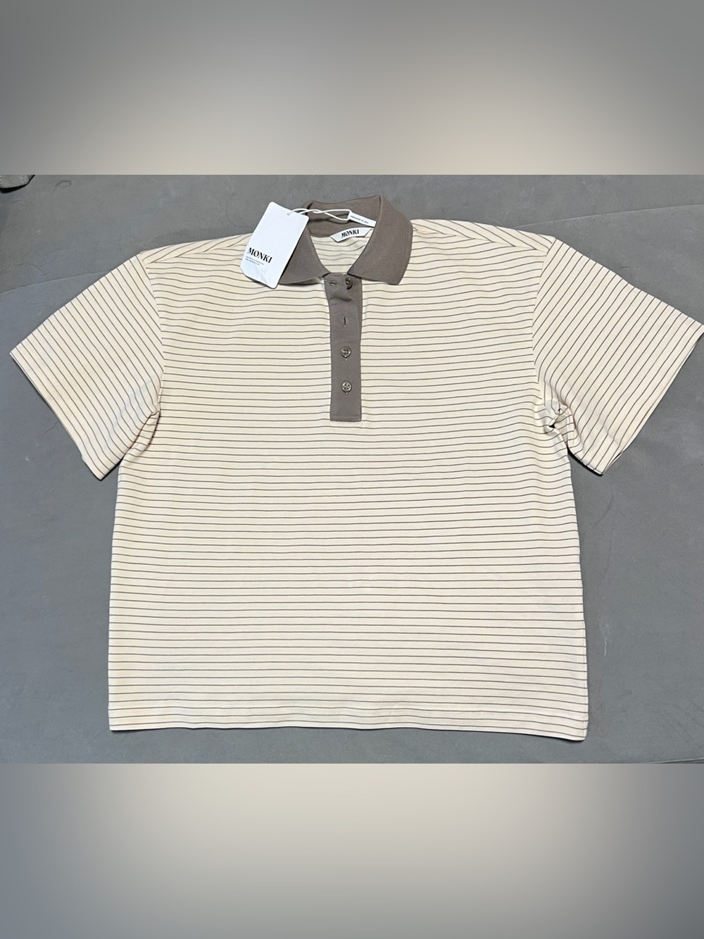 Monki boxy oversized fit short sleeve rugby polo shirt in off white/lemon stripe